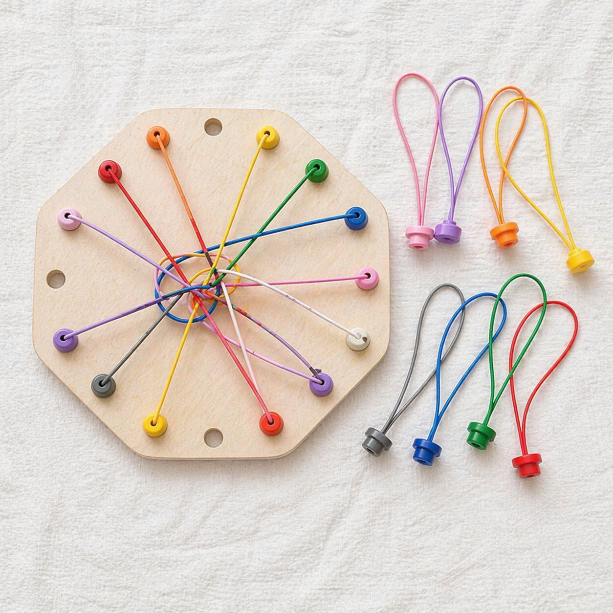 Minio Greedy Caterpillar – Fädel- & Reihenfolgespiel Playbox