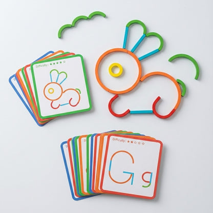 Minio ''Sticks & Rings'' – Kreatives Muster- & Formenspiel Playbox